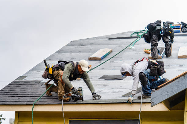 Professional Roofing technician working in Northfield, VT